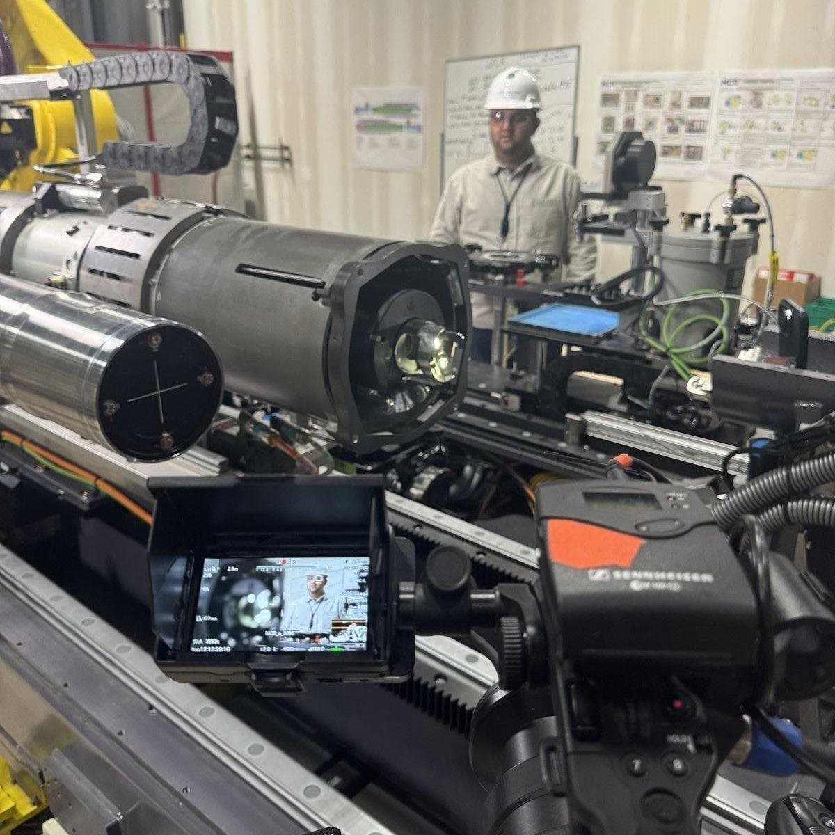 Behind the scenes of filming in a machinery heavy space